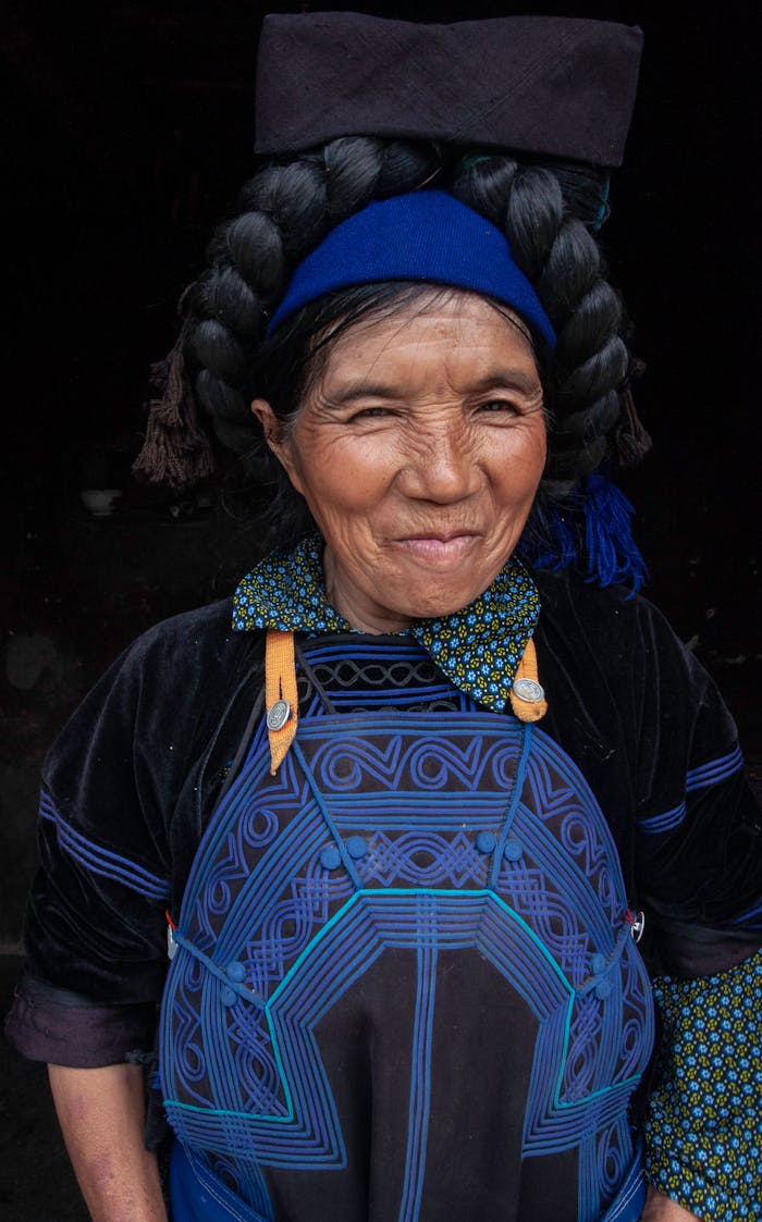 Smiling Woman in Traditional Clothing